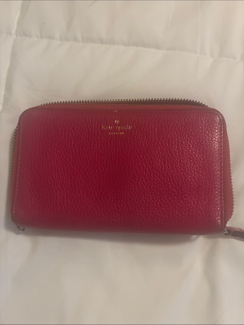 kate spade pink pebbled leather zip-around wallet